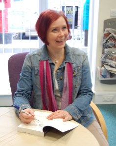 Yes! Readers came! My first visitor arrived at just a few minutes after 10 a.m. Witness: my first author signature in a newly-purchased reader's copy of Sophie's Turn. Awesome feeling!