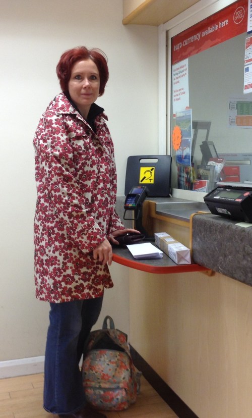 At the post office keeping the clerk busy with all this international mail. She hasn't asked me yet why I keep sending all this stuff out all over the place, but I can tell that's she's totally curious! :-)